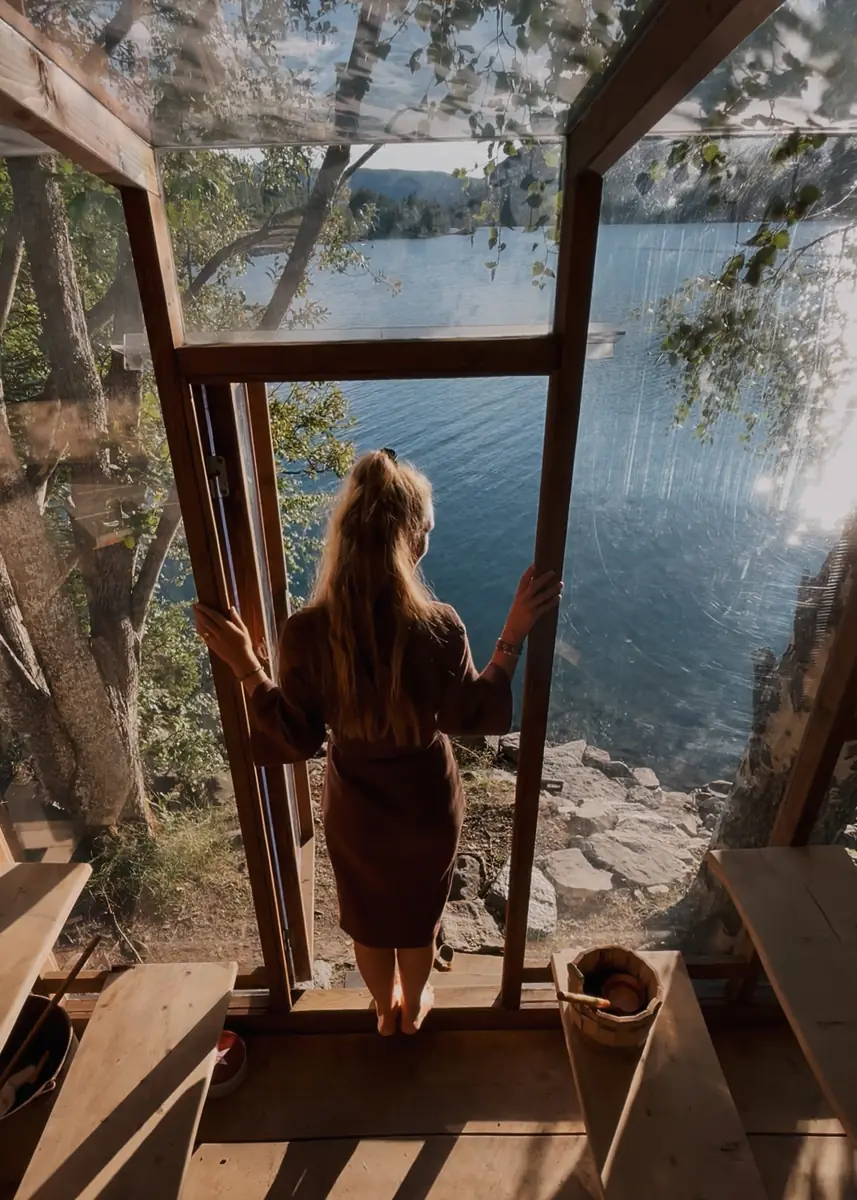 The sauna window opening straight onto the water