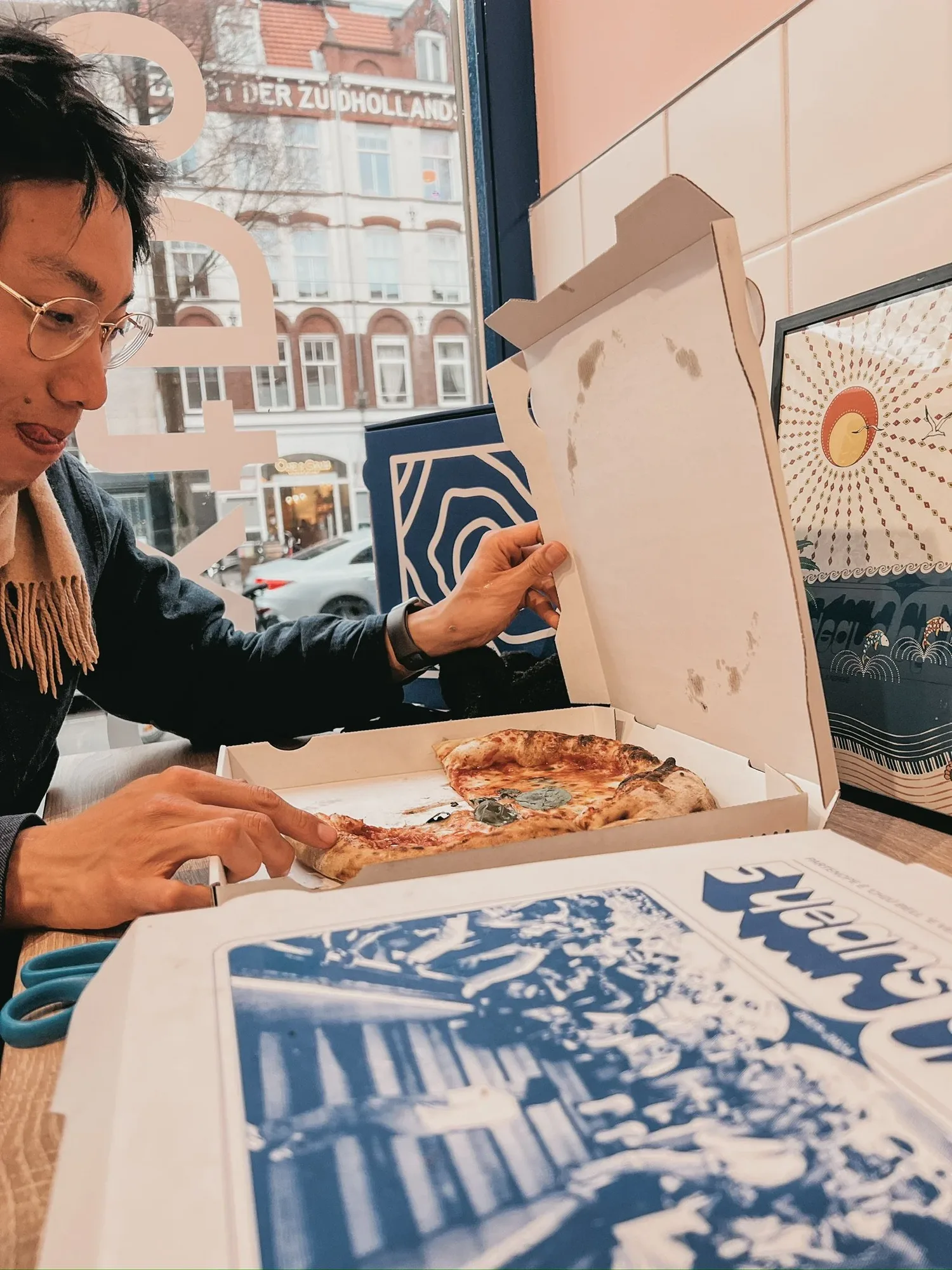 frank is looking at the best pizza
