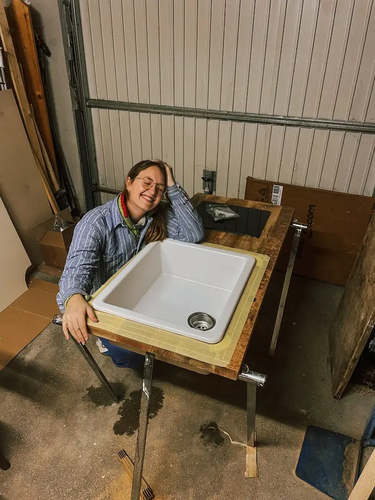 evelyne building the kitchen around the sink