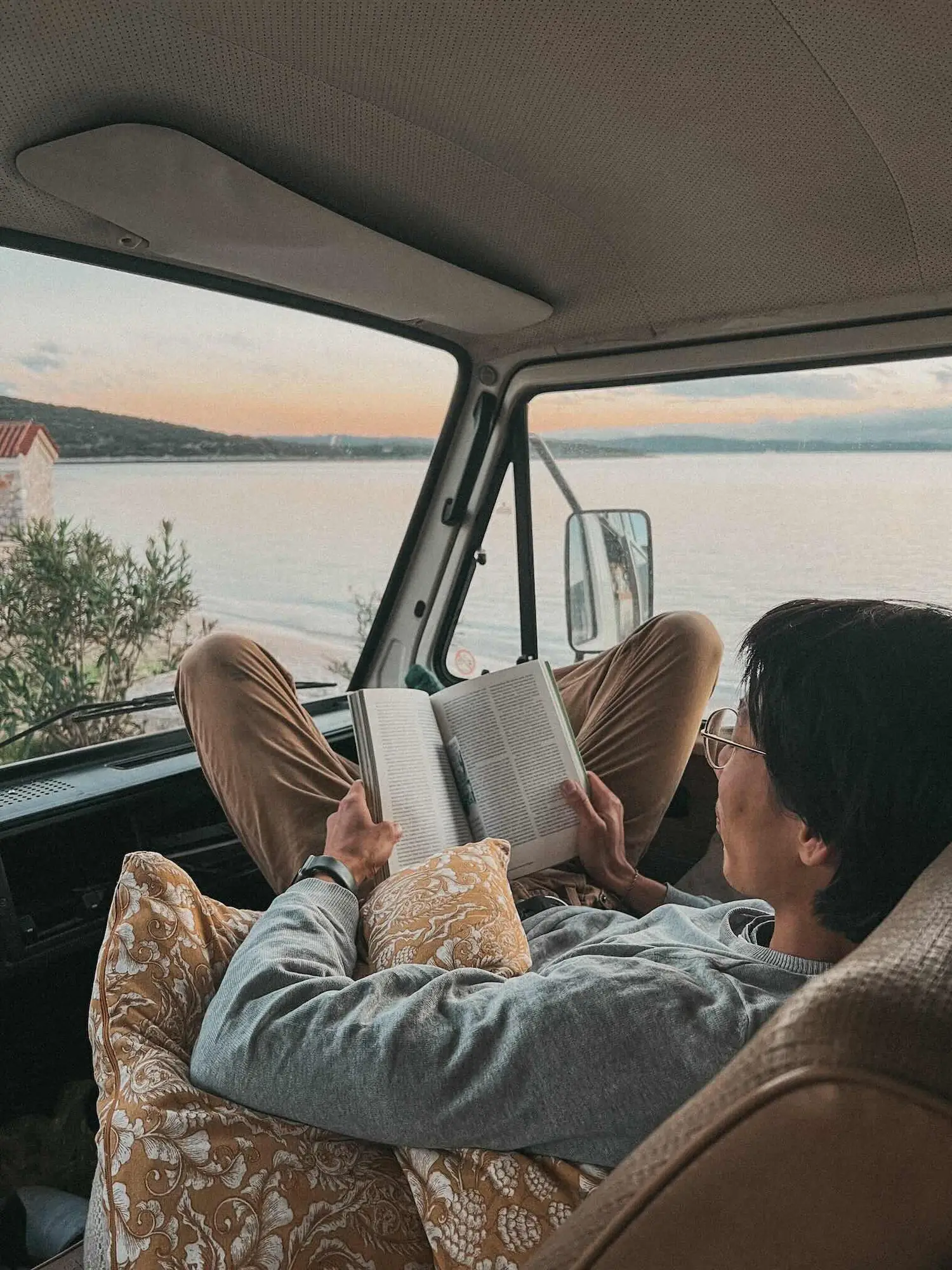 reading in the warm van in the evening