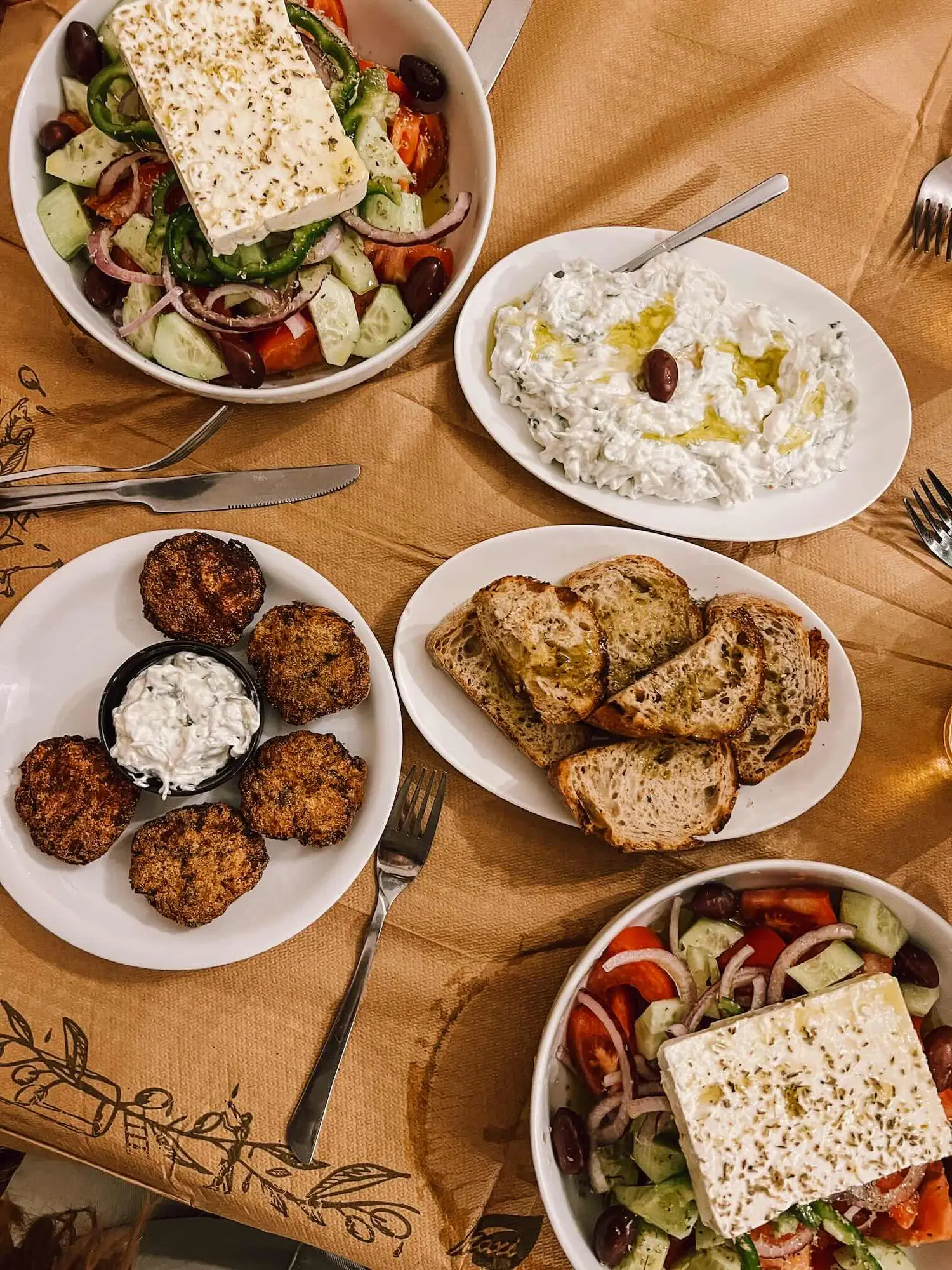 grilled zucchini balls, tzatziki and greek salad