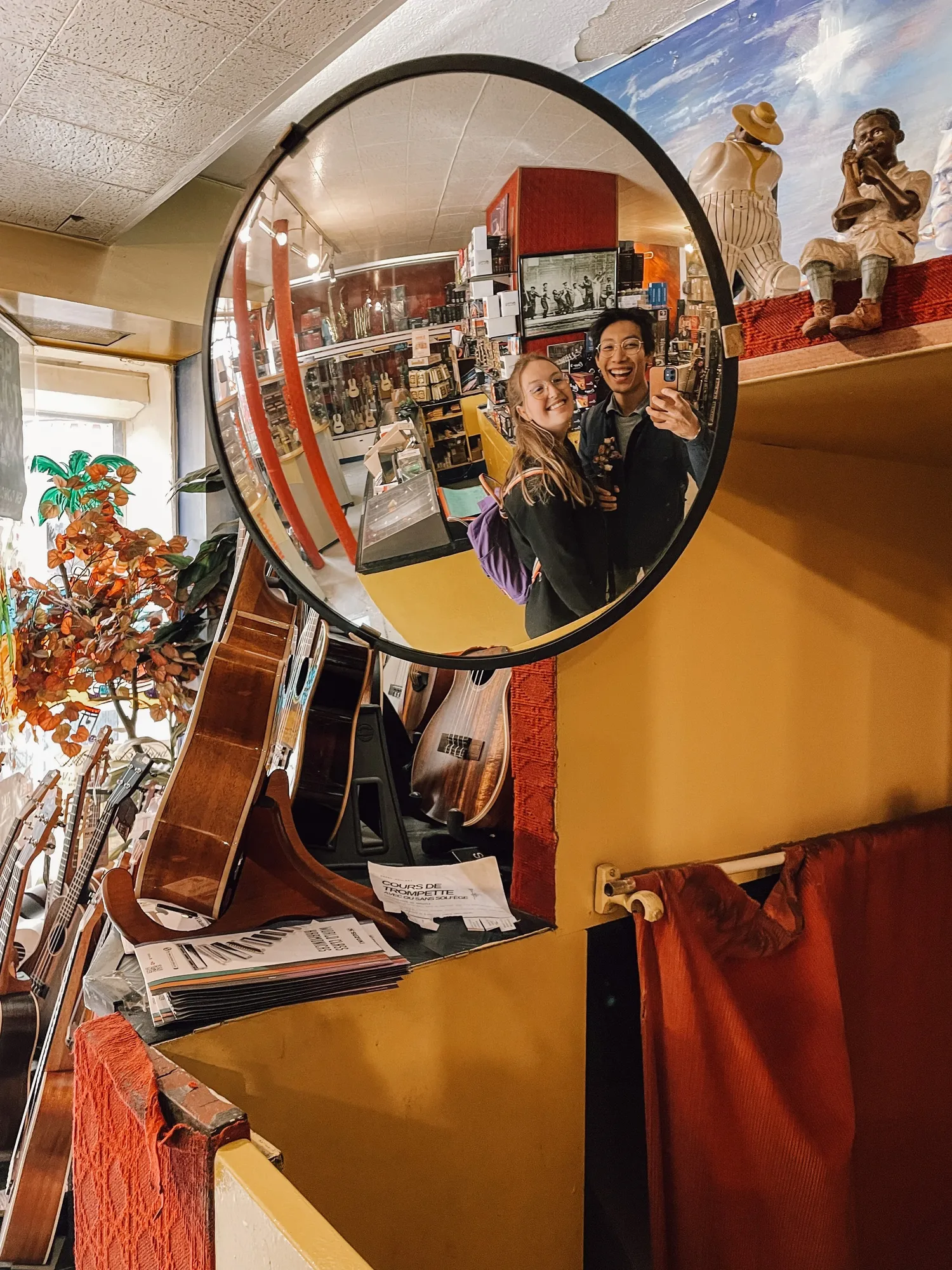 this used guitar store on guitar street has a special mirror!