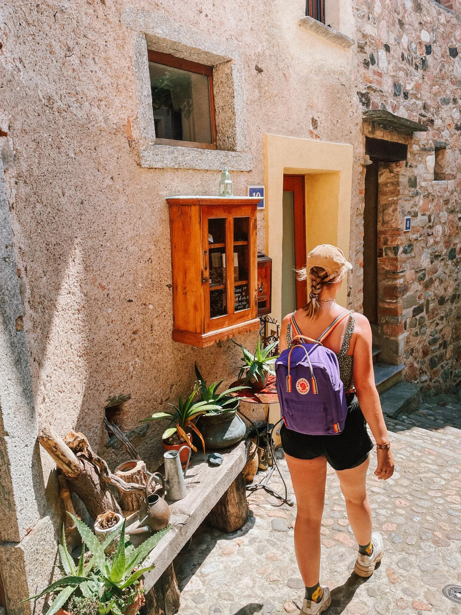 through the narrow alleyways