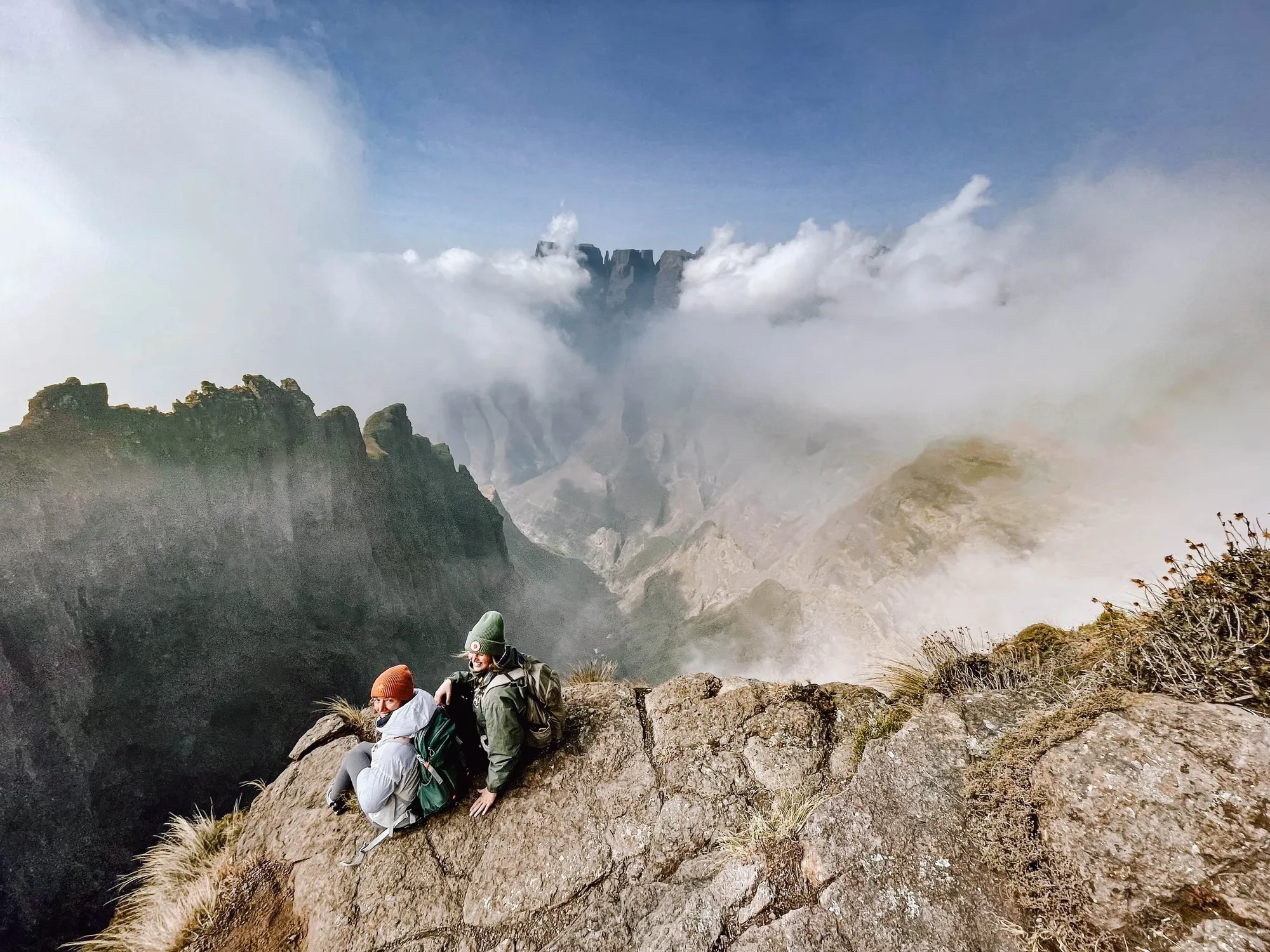 above the clouds with an impressive view into the valley below