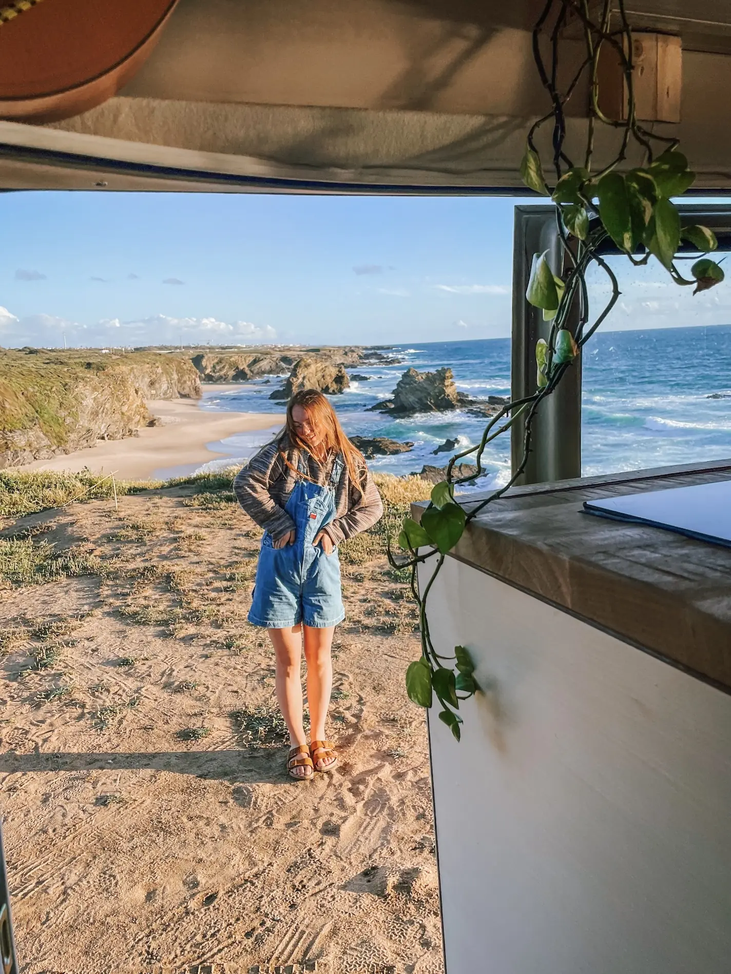 evelyne walking on the beach toward the sea