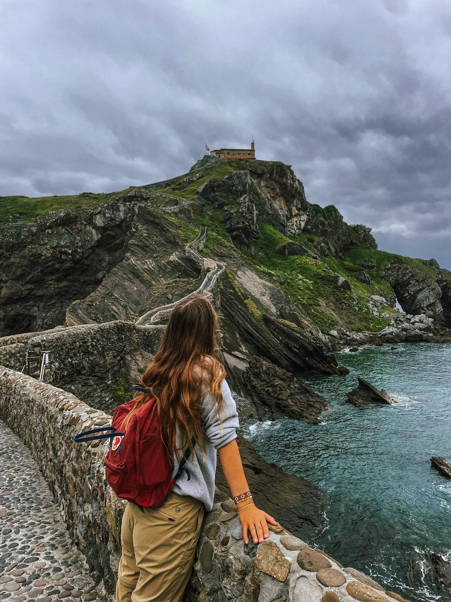 evelyne looking out at the hermitage on the rock