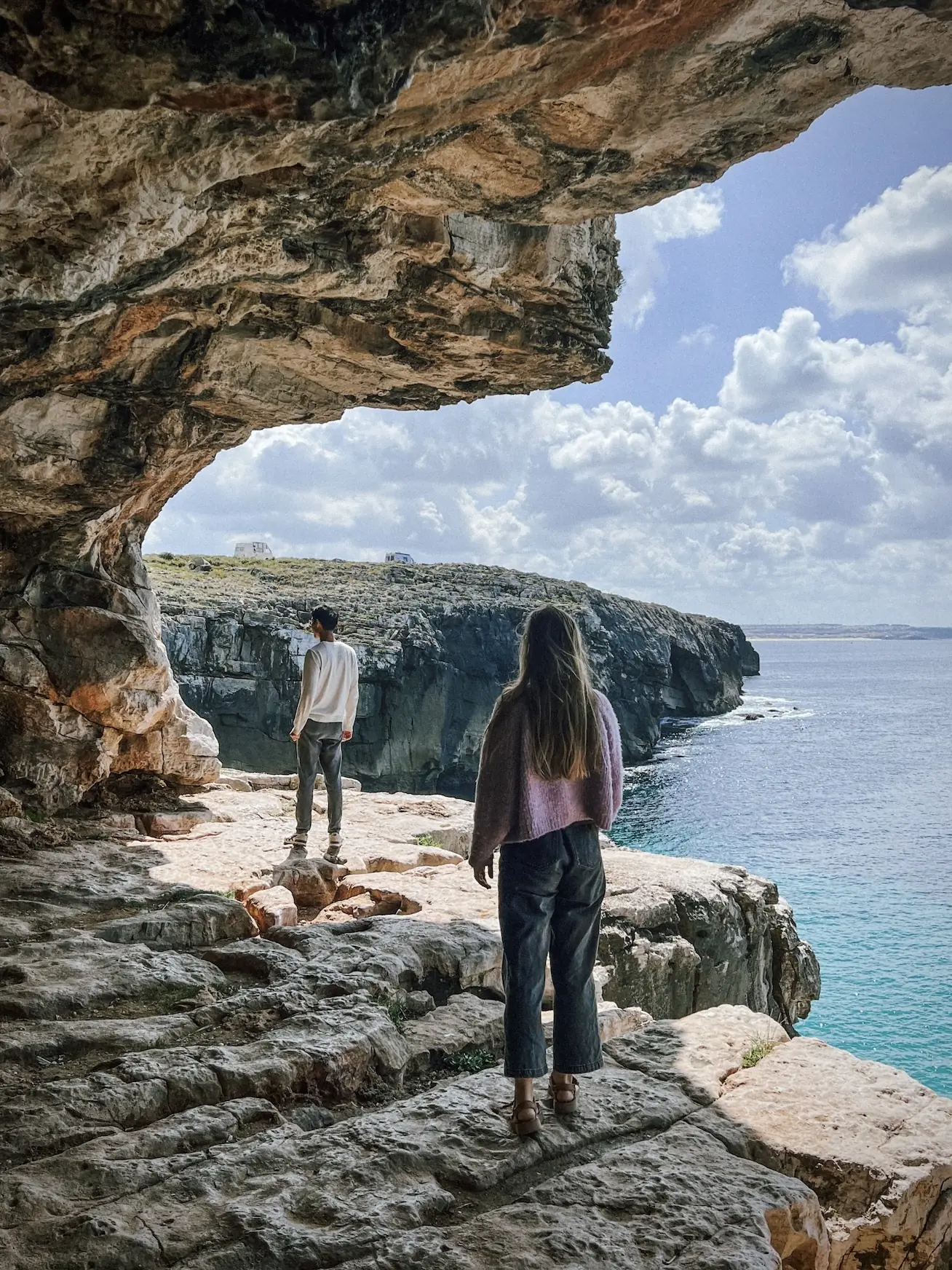frank and evelyne in a sea cave near peniche