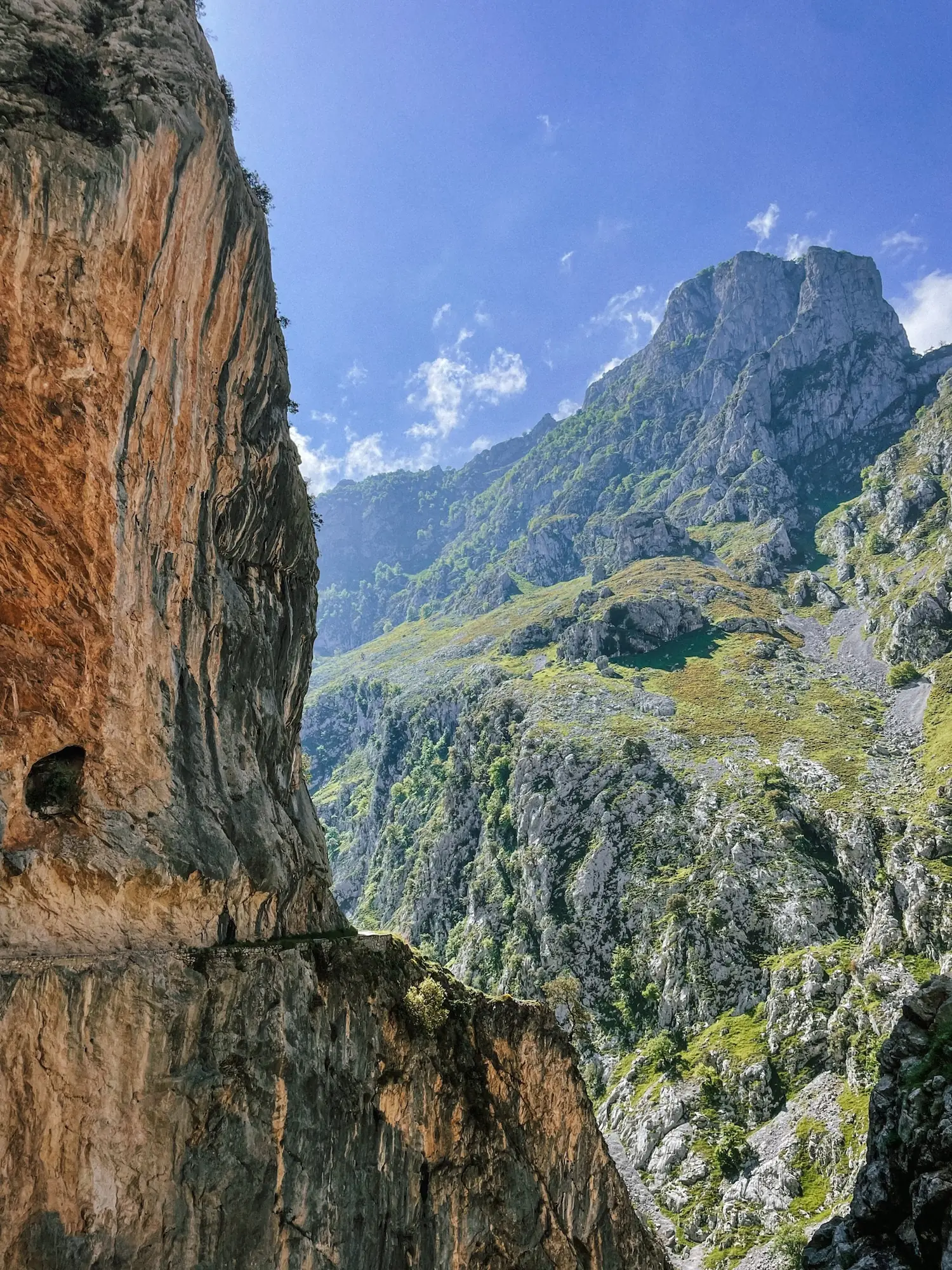 the ruta del cares running along the cliffs