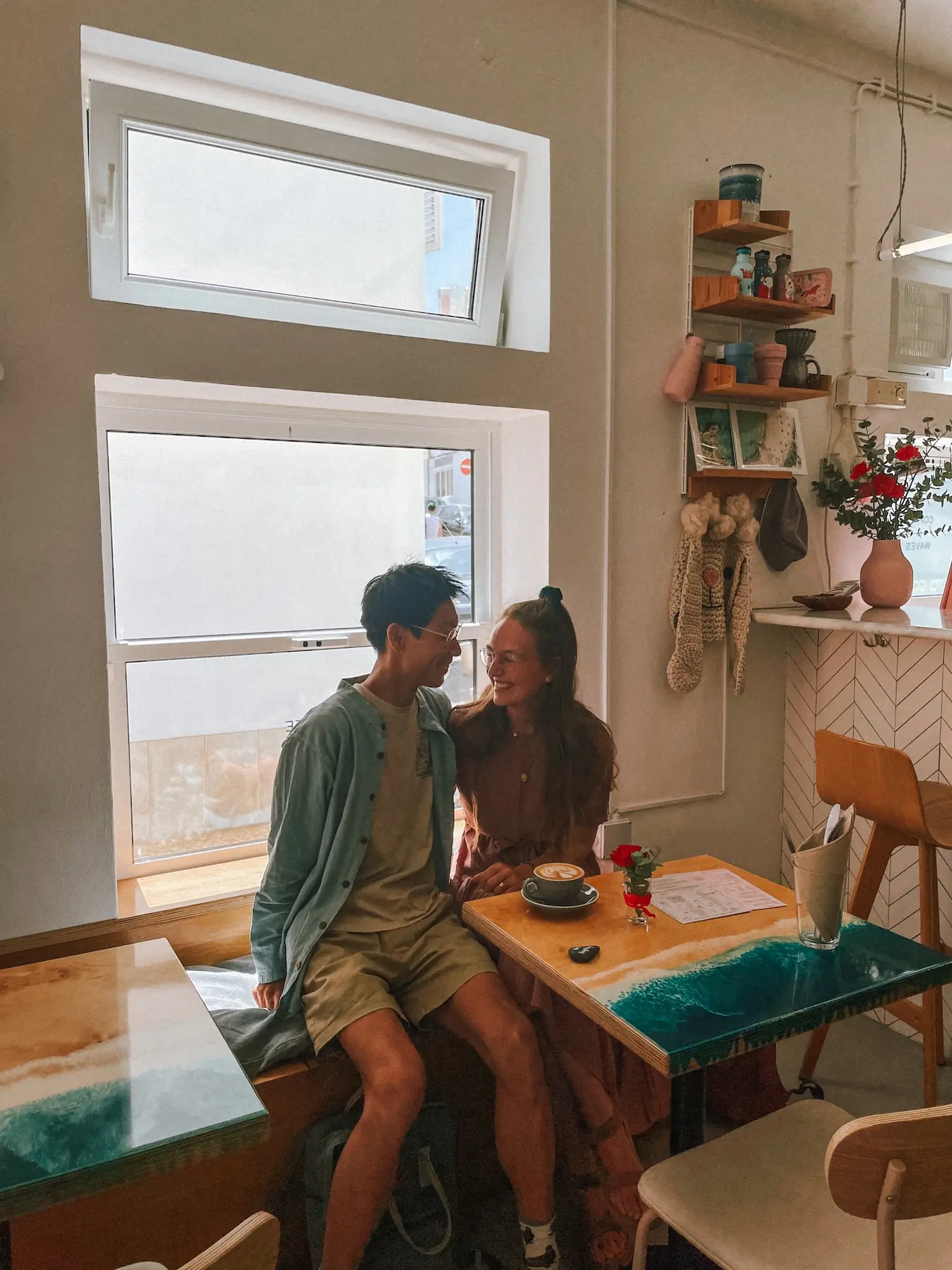 frank and evelyne in a bright surf café