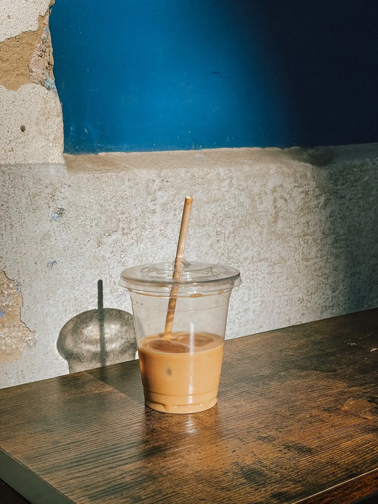 an iced coffee on a café table
