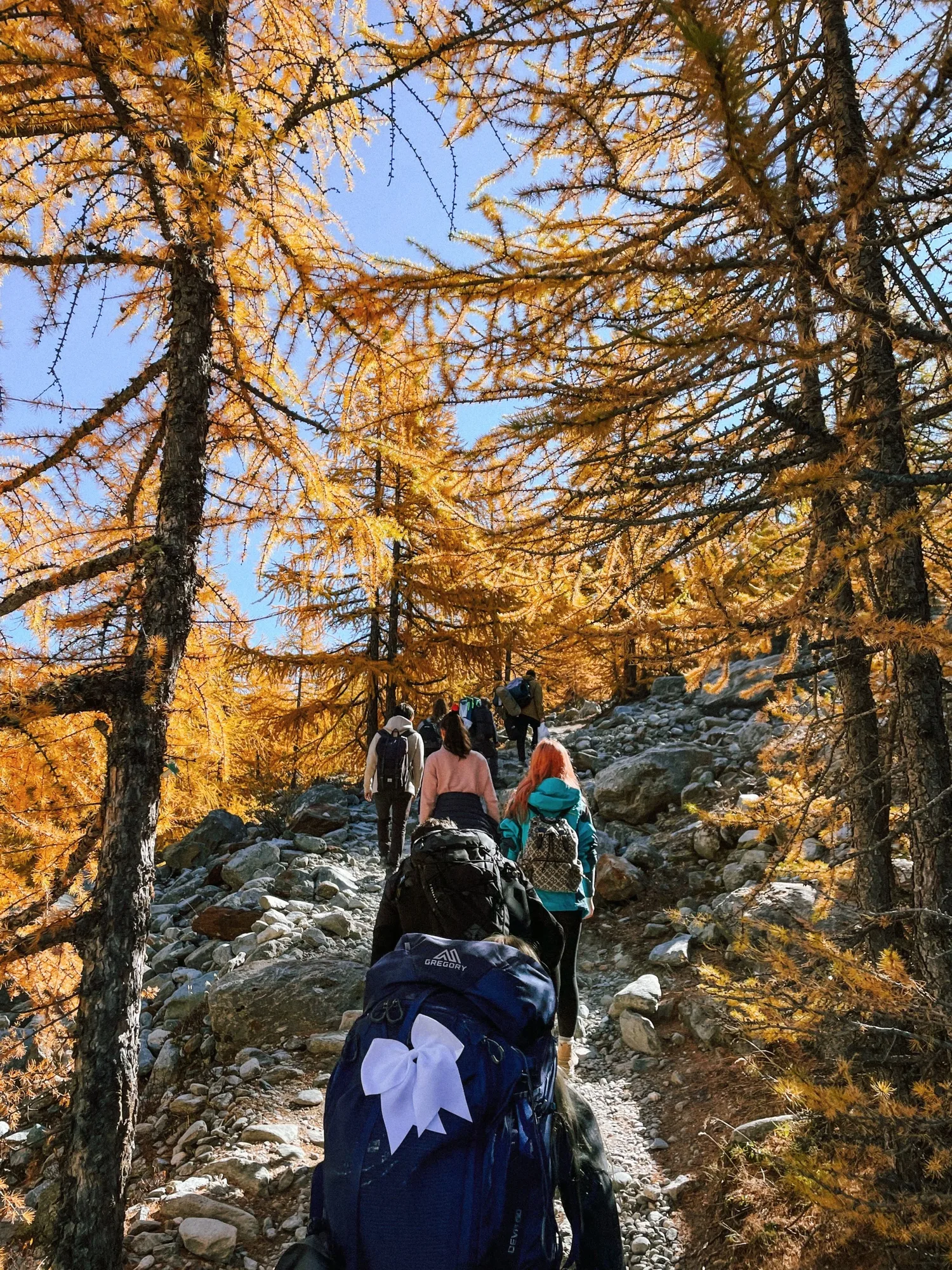 friends hiking the five-lake hike in zermatt